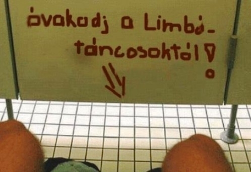 Figyelmeztetés egy nyilvános budiban